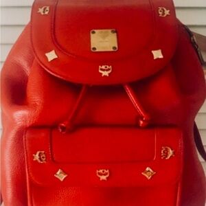 MCM Red Pebble Leather Logo-Stud Drawstring Backpack